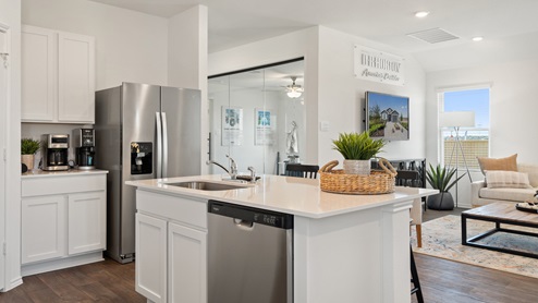 Gorgeous kitchen with stainless steel appliances.