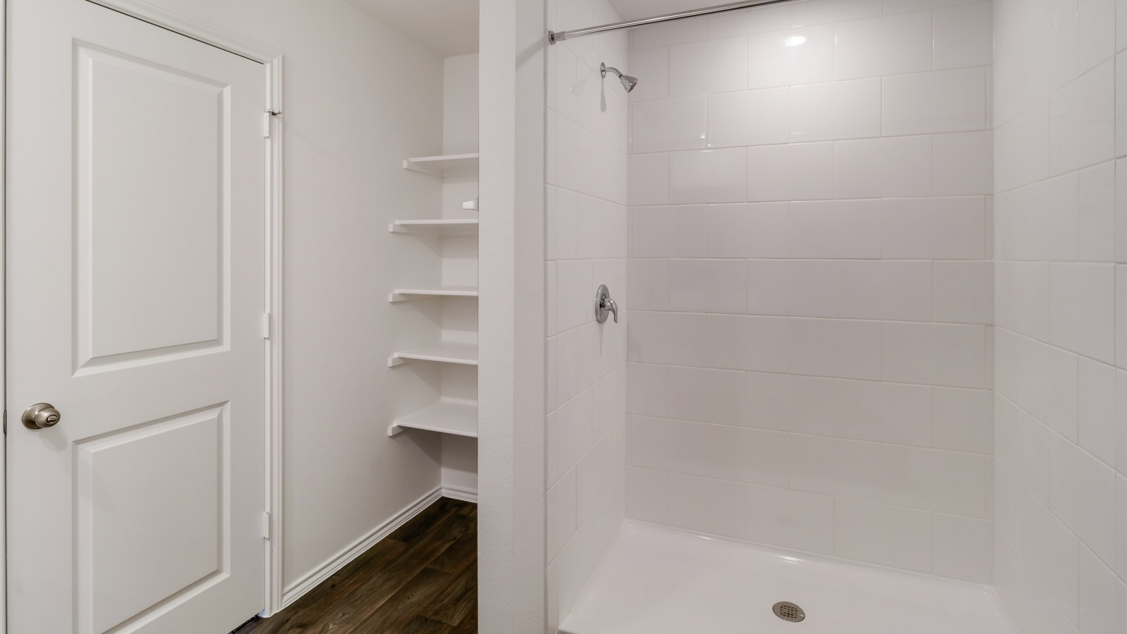 Another view of the owner’s ensuite showcasing spa-inspired finishes and layout