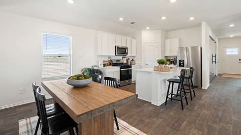 Cozy dining area and kitchen.