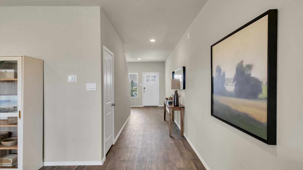 Long foyer leading to living room.