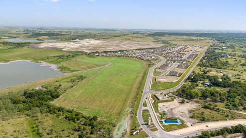 Drone Image of community and lake.