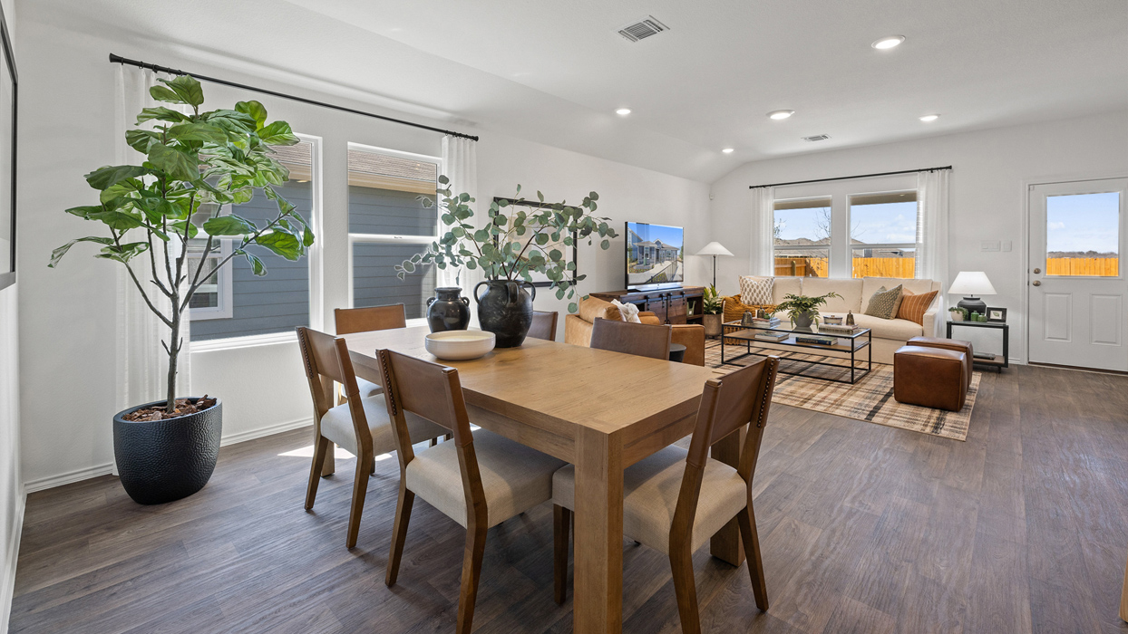 dining room with a table with 6 chairs surrounding