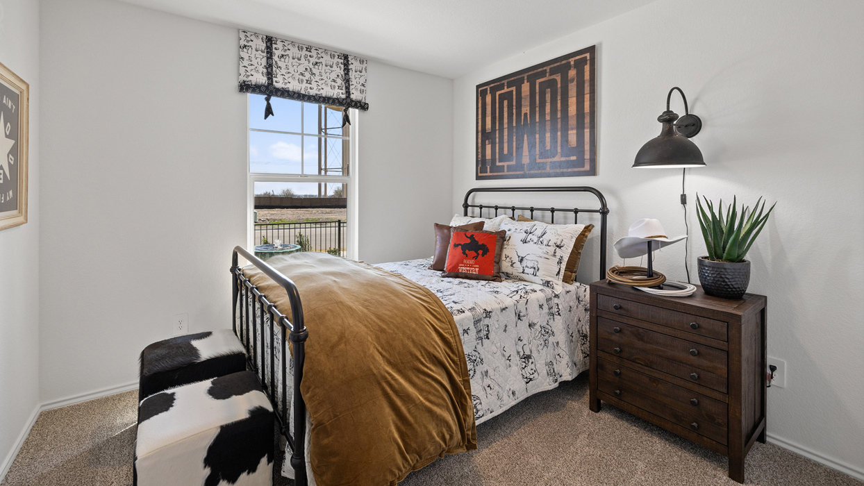 bedroom with rustic decor and a window