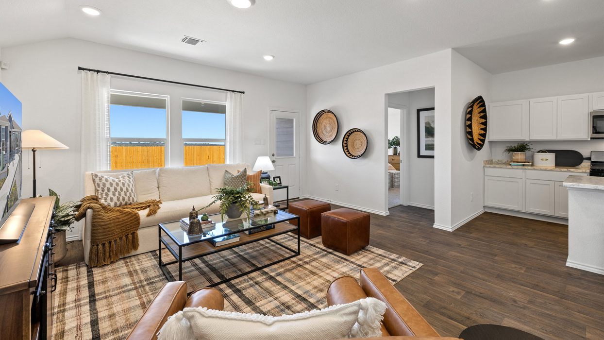 spacious living room with brown and yellow decor