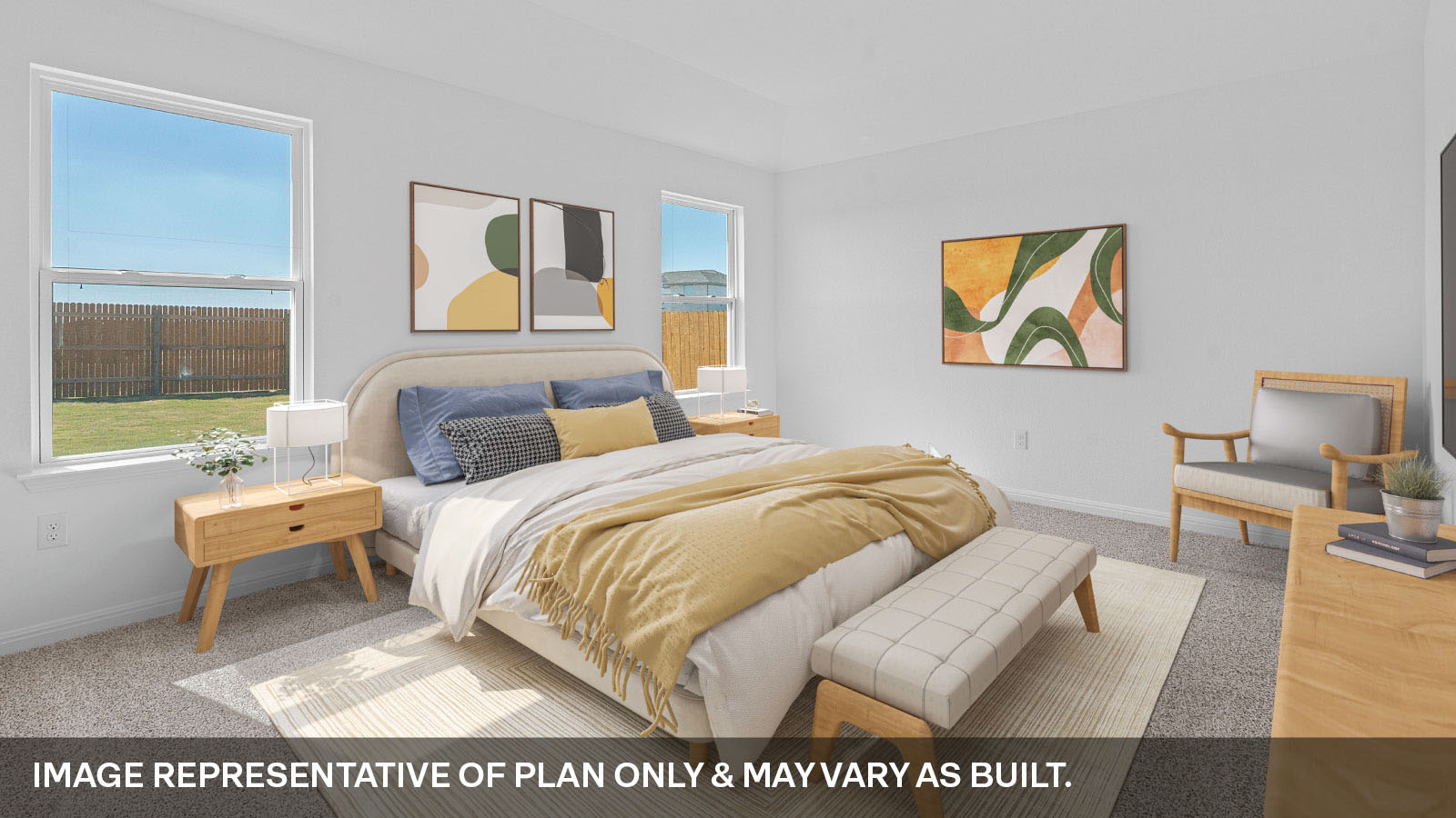 Primary bedroom with two windows.