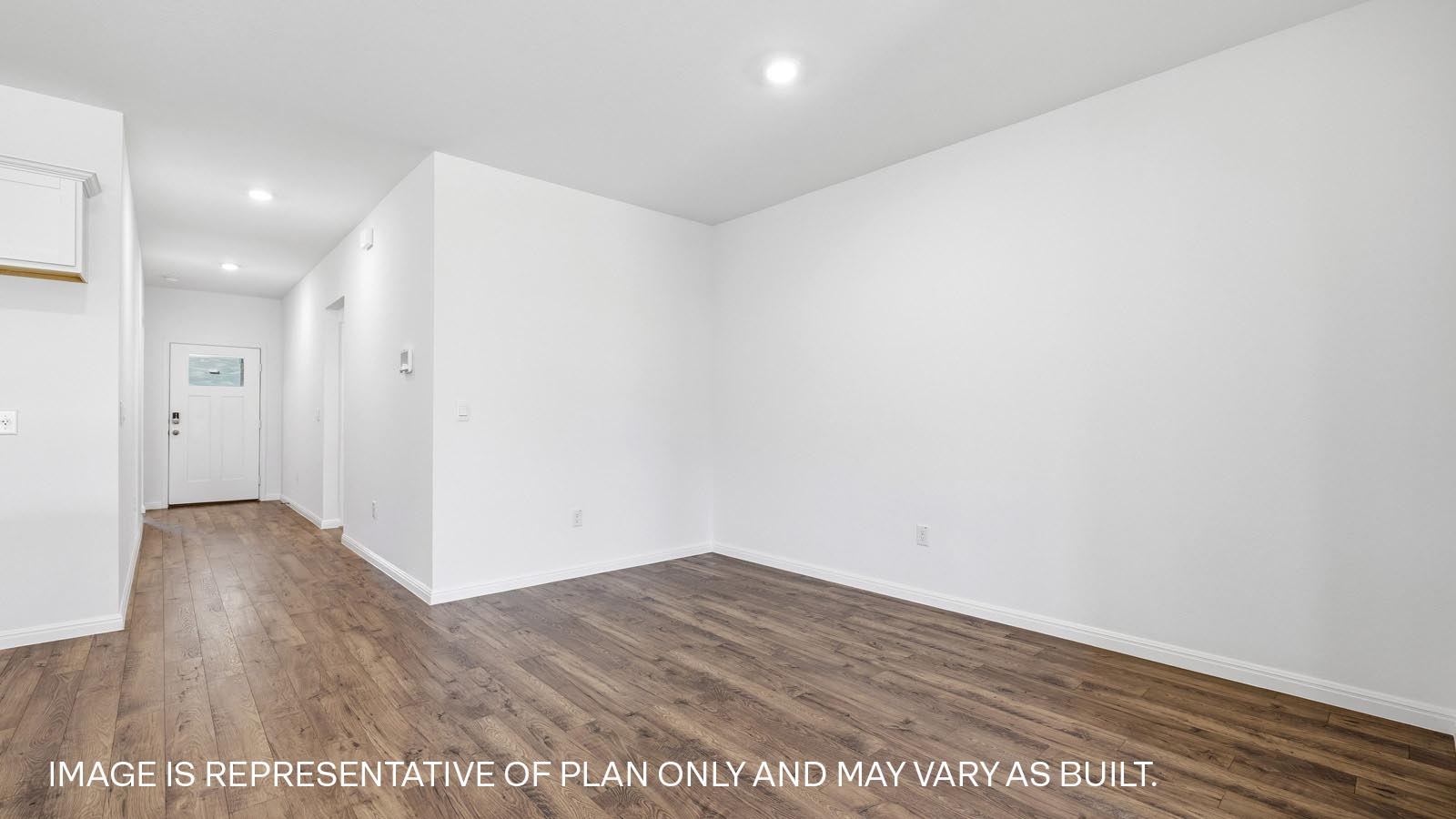 Open living area with three windows.