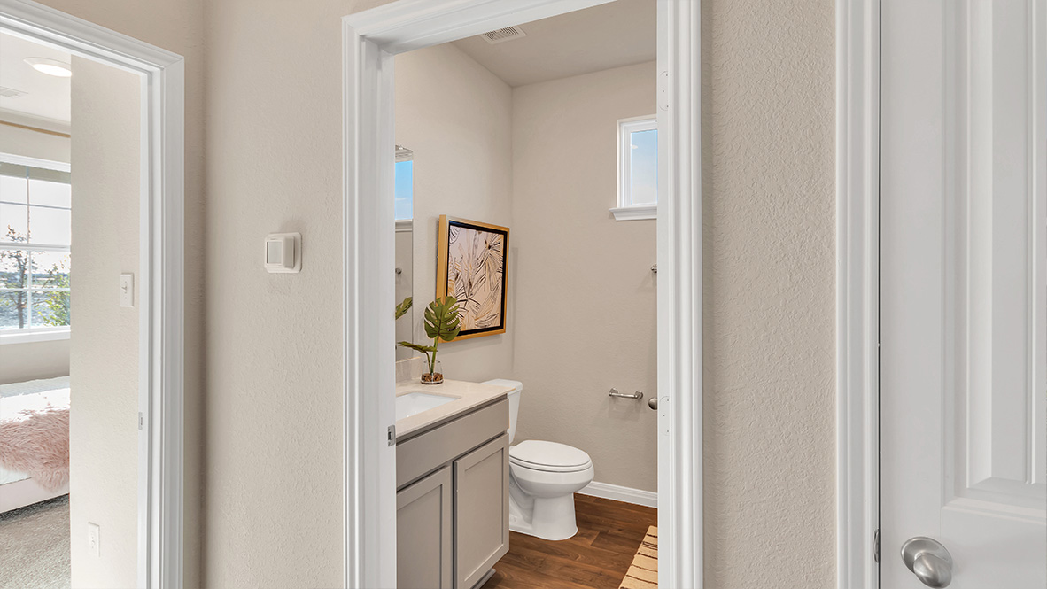 bathroom featuring a vanity sink and toilet