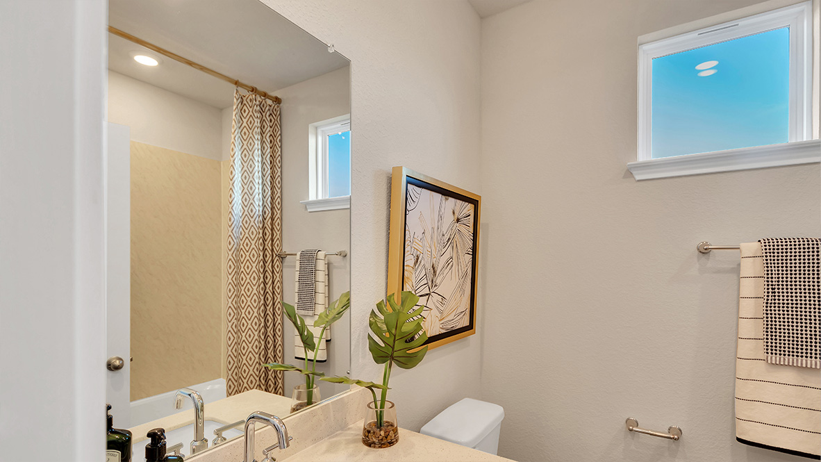 bathroom featuring a vanity sink and toilet