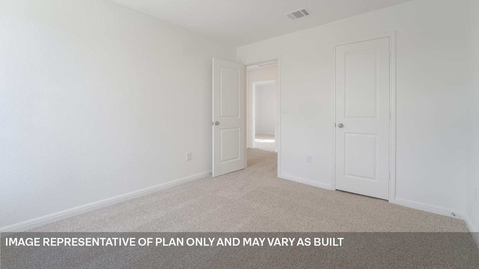 Bedroom 4 with carpeted flooring and window.