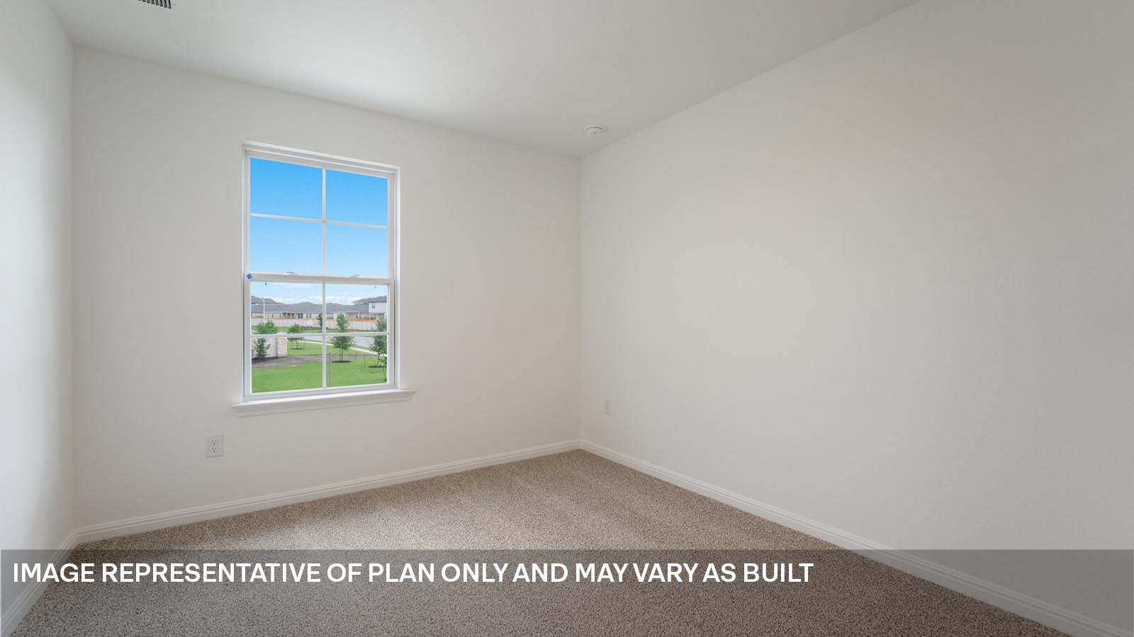 Bedroom 3 with carpeted flooring and window.