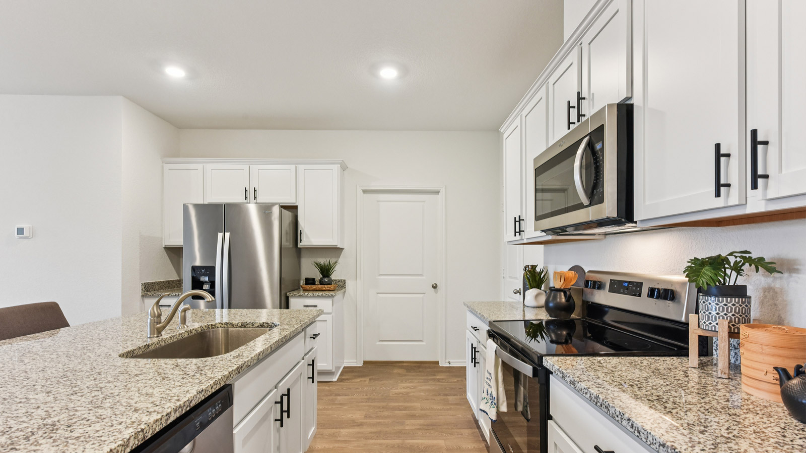 Stainless steel range and microwave.
