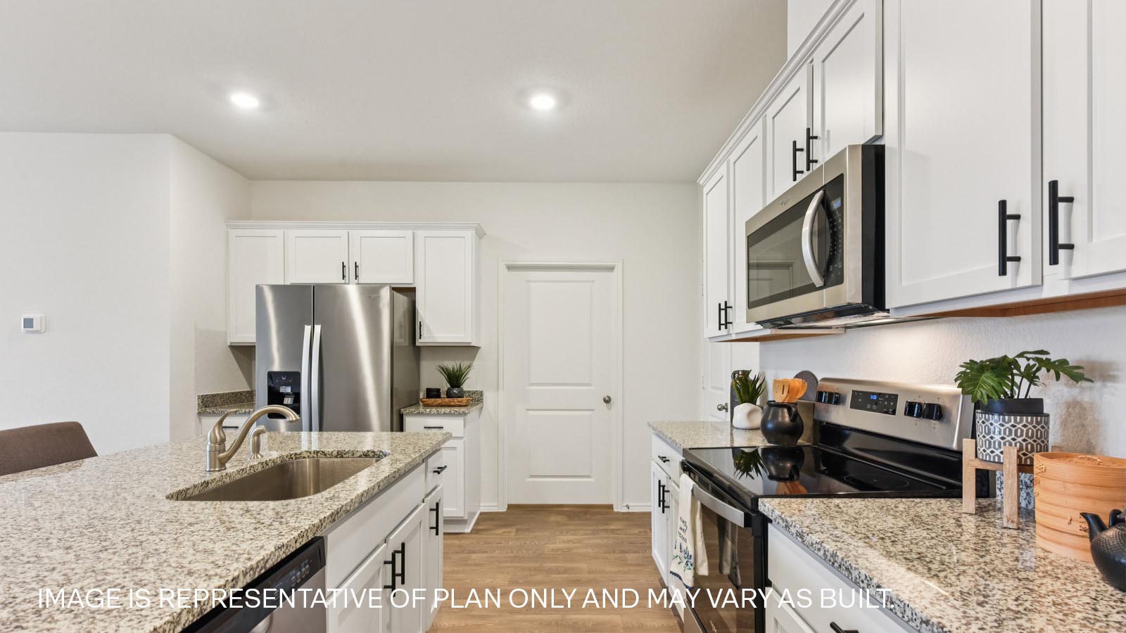 Stainless steel range and microwave.