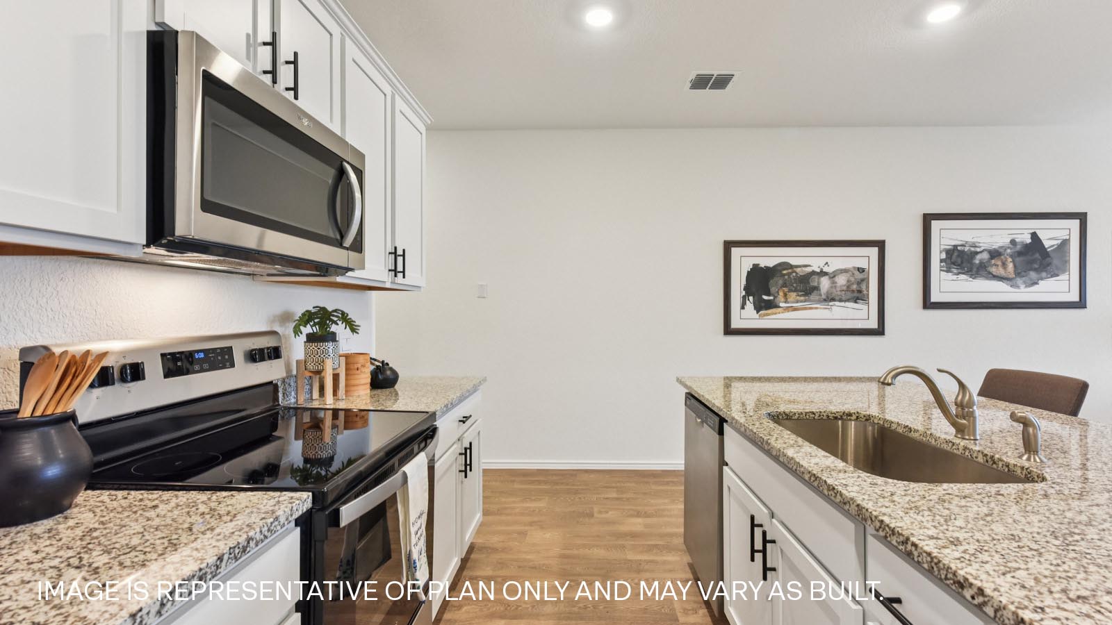 Single bowl undermount sink and stainless steel dishwasher.