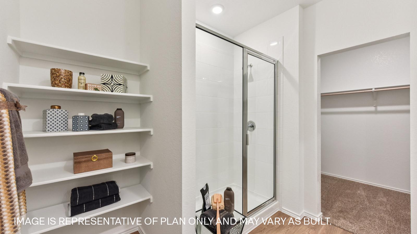 Bathroom 1 with walk-in shower and walk-in closet.
