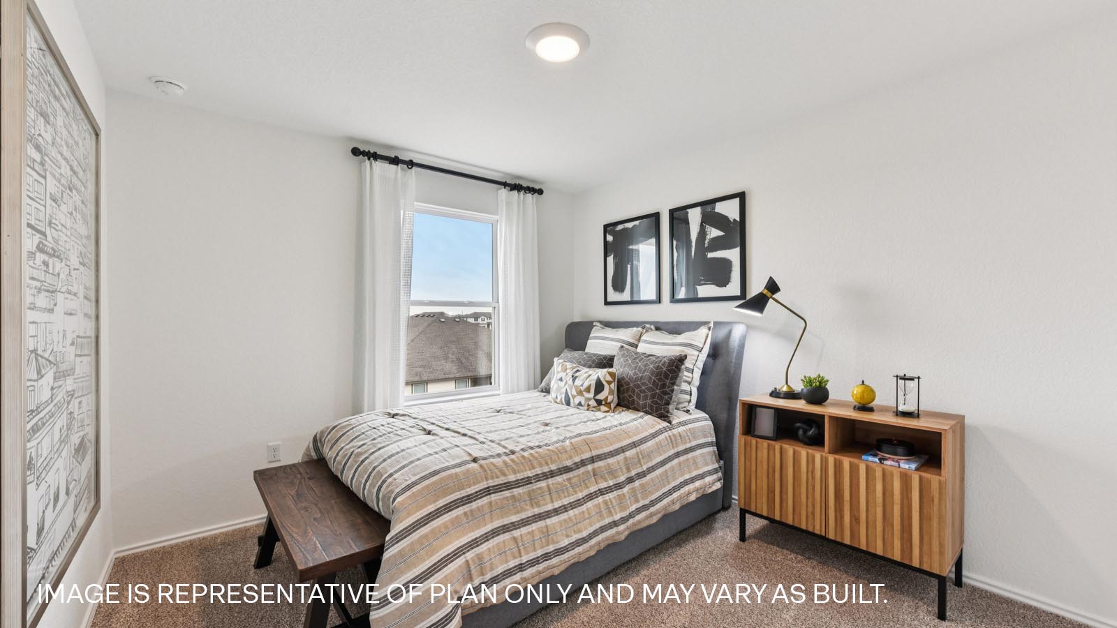 Bedroom 3 with carpeted flooring.