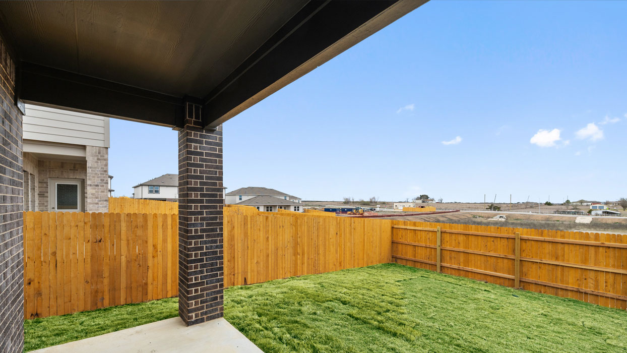 1946 Pecan Floorplan covered back patio gallery image - Palomino in Manor TX