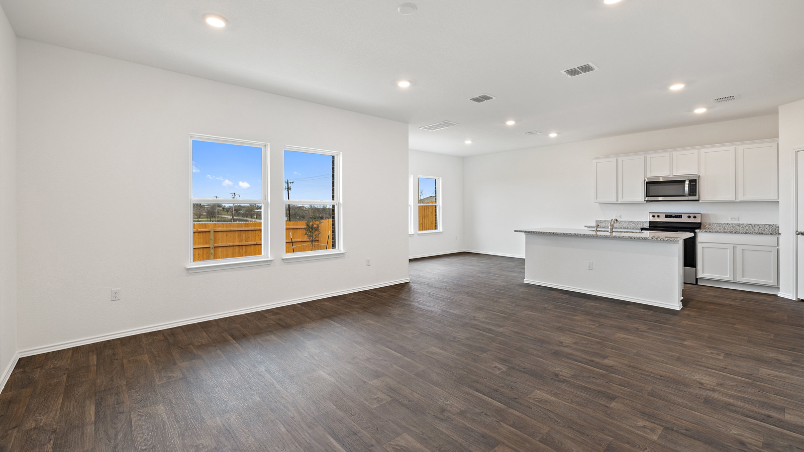 1946 Pecan Floorplan open concept living room gallery image - Palomino in Manor TX