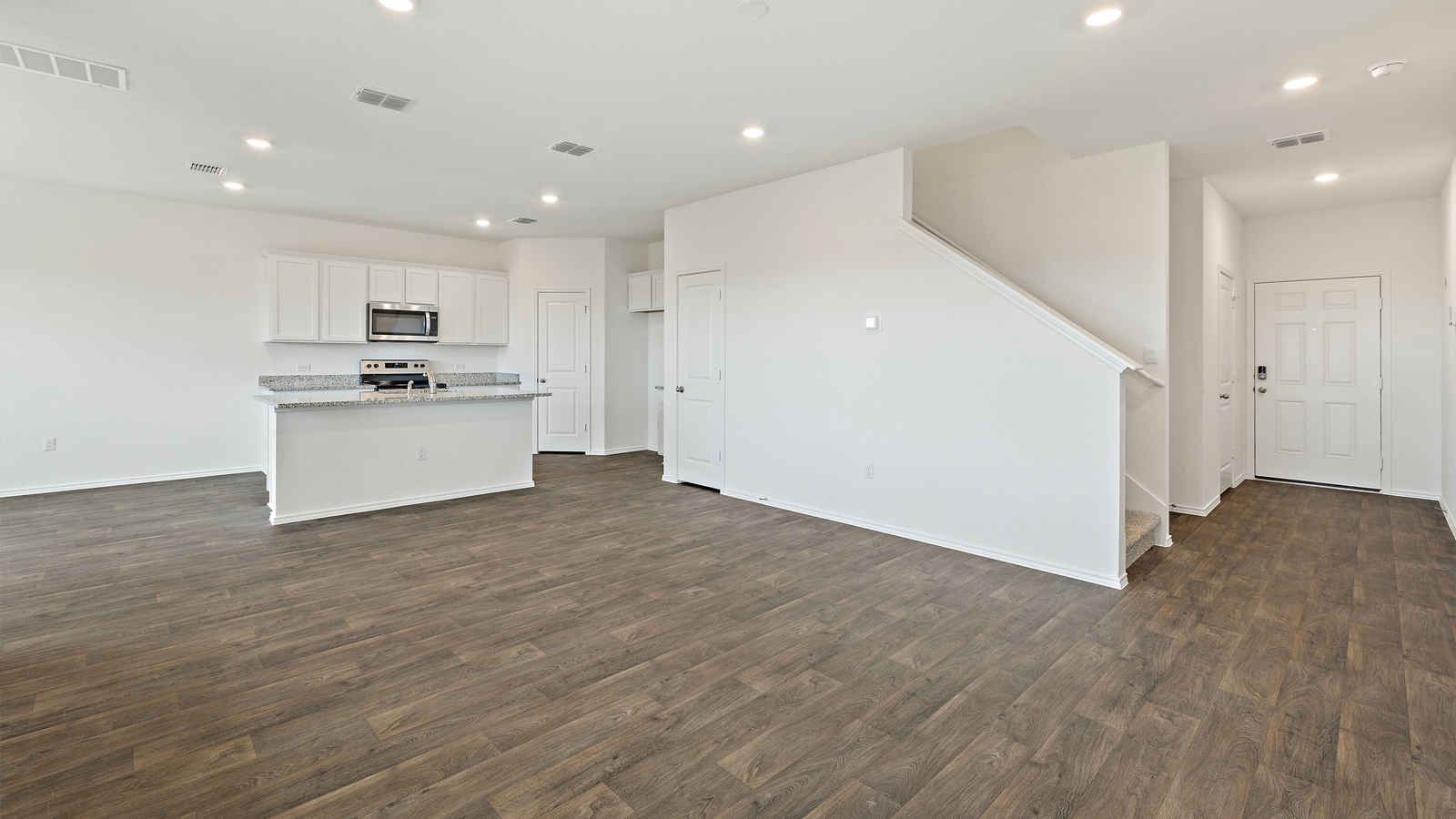 1946 Pecan Floorplan open concept living room gallery image - Palomino in Manor TX