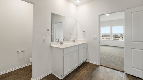 2223 Sycamore Floorplan main bathroom with walk-in shower gallery image - Palomino in Manor TX