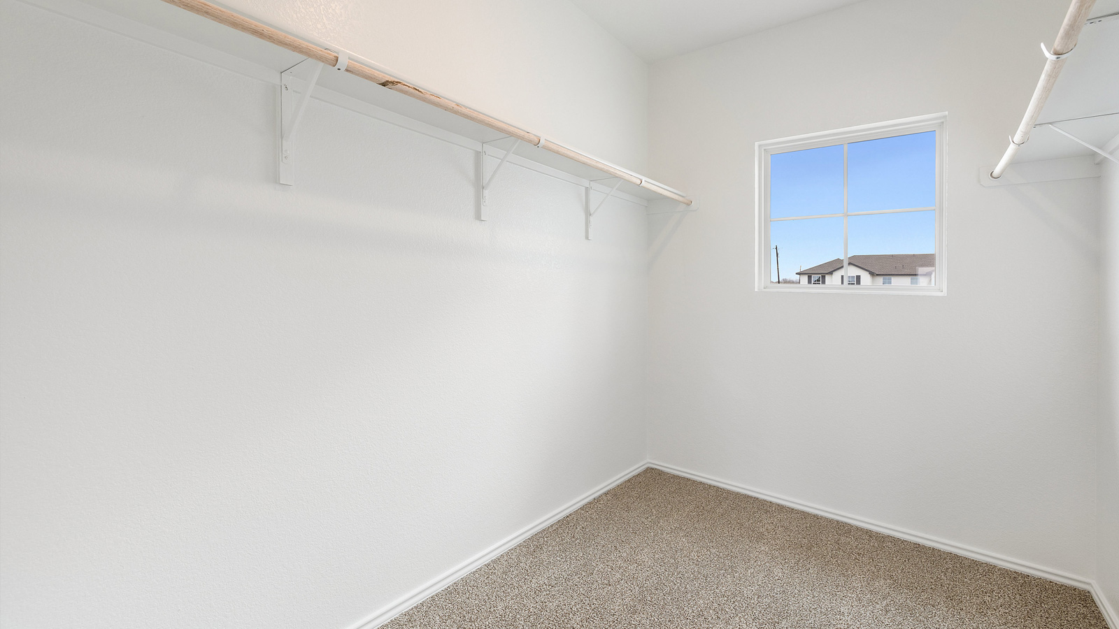 2223 Sycamore Floorplan main bathroom with oversized closet gallery image - Palomino in Manor TX