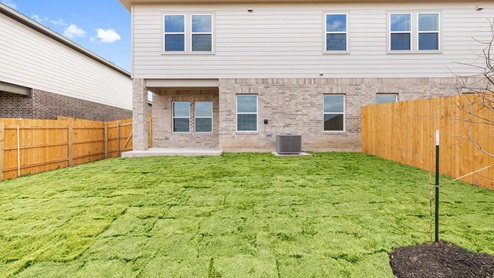 2223 Sycamore Floorplan back exterior with covered patio gallery image - Palomino in Manor TX