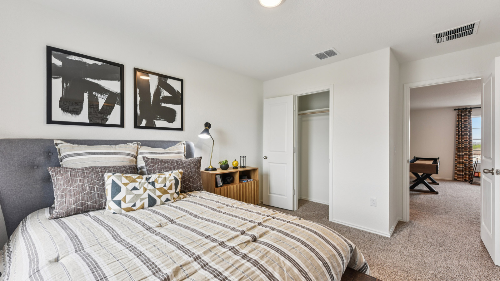 Bedroom 3 with carpeted flooring and window.