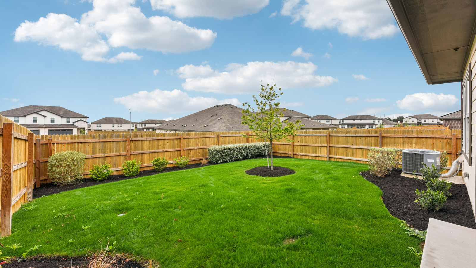Private backyard with full Bermuda sod and irrigation.