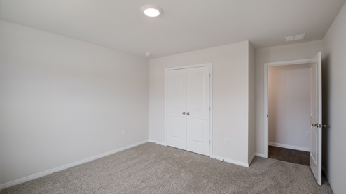 McClendon Floorplan 1264 secondary bedroom – Talavera in Kyle TX