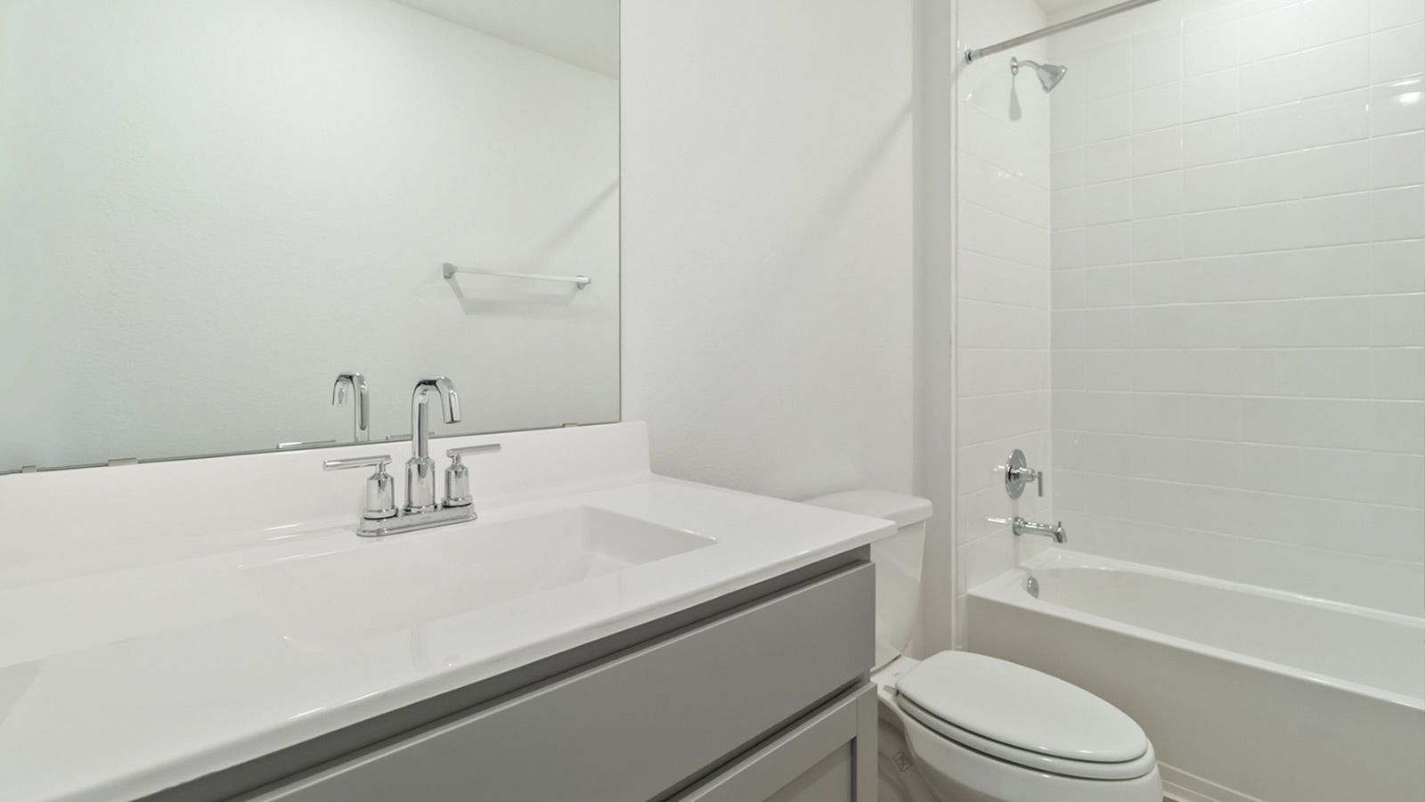 Bathroom 2 with single vanity sink.