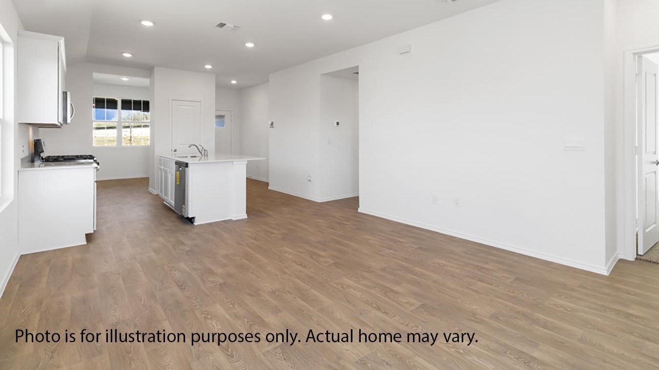 Living and dining area next to kitchen