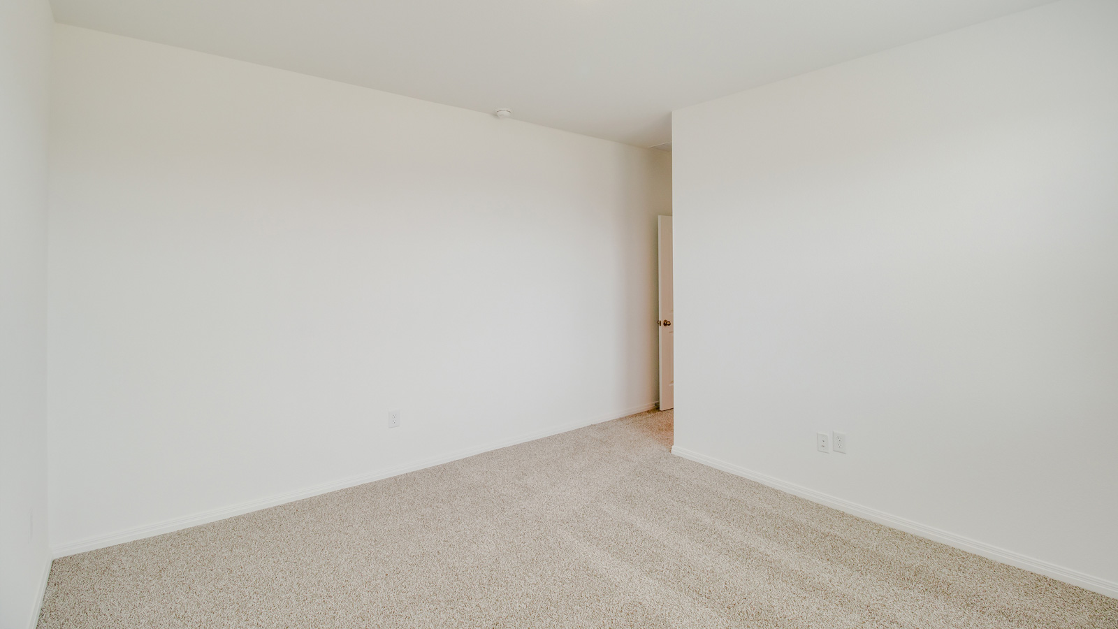 Primary bedroom designed with privacy and space in mind with a flow into a spa-inspired ensuite bathroom and walk-in closet