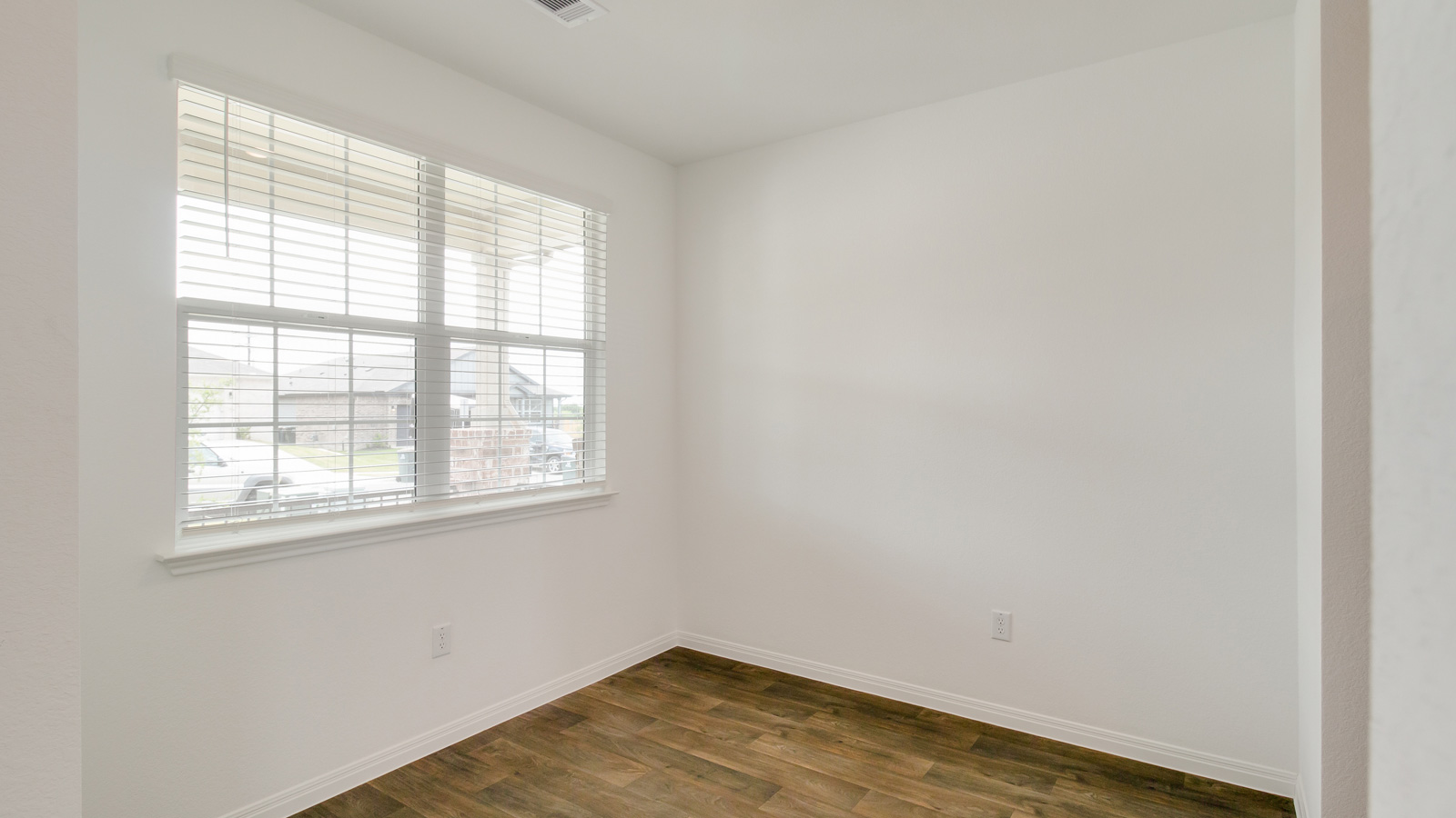 Interior bedroom with large window