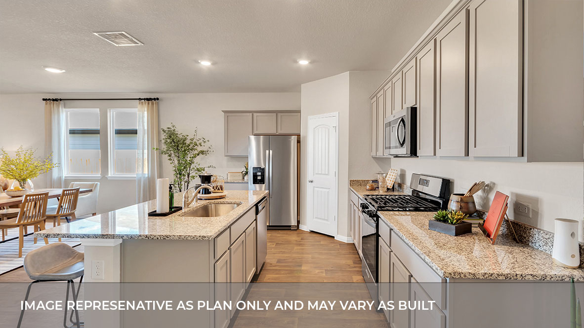 Interior kitchen with center island and light grey cabinets
