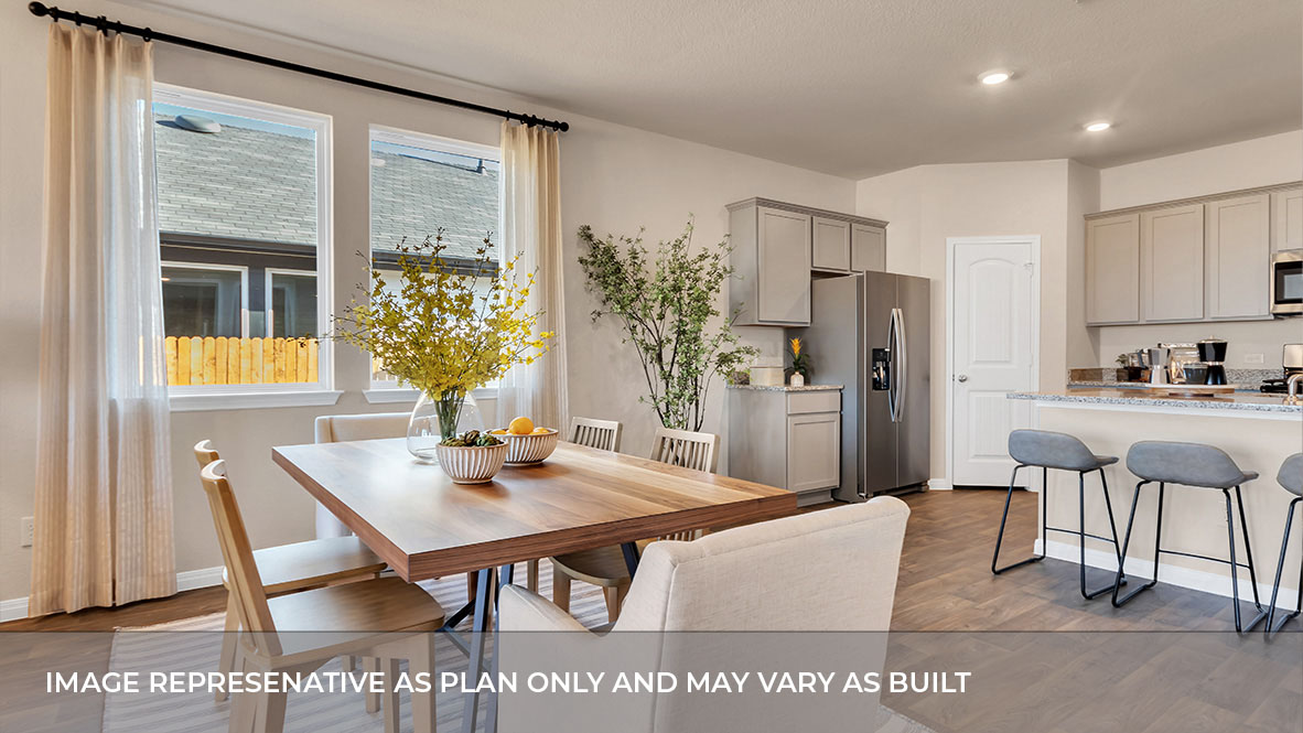 Interior dining area with window next to kitchen
