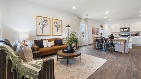 Open concept living room with windows