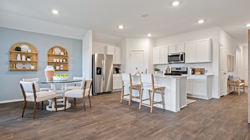 open concept kitchen and dining area