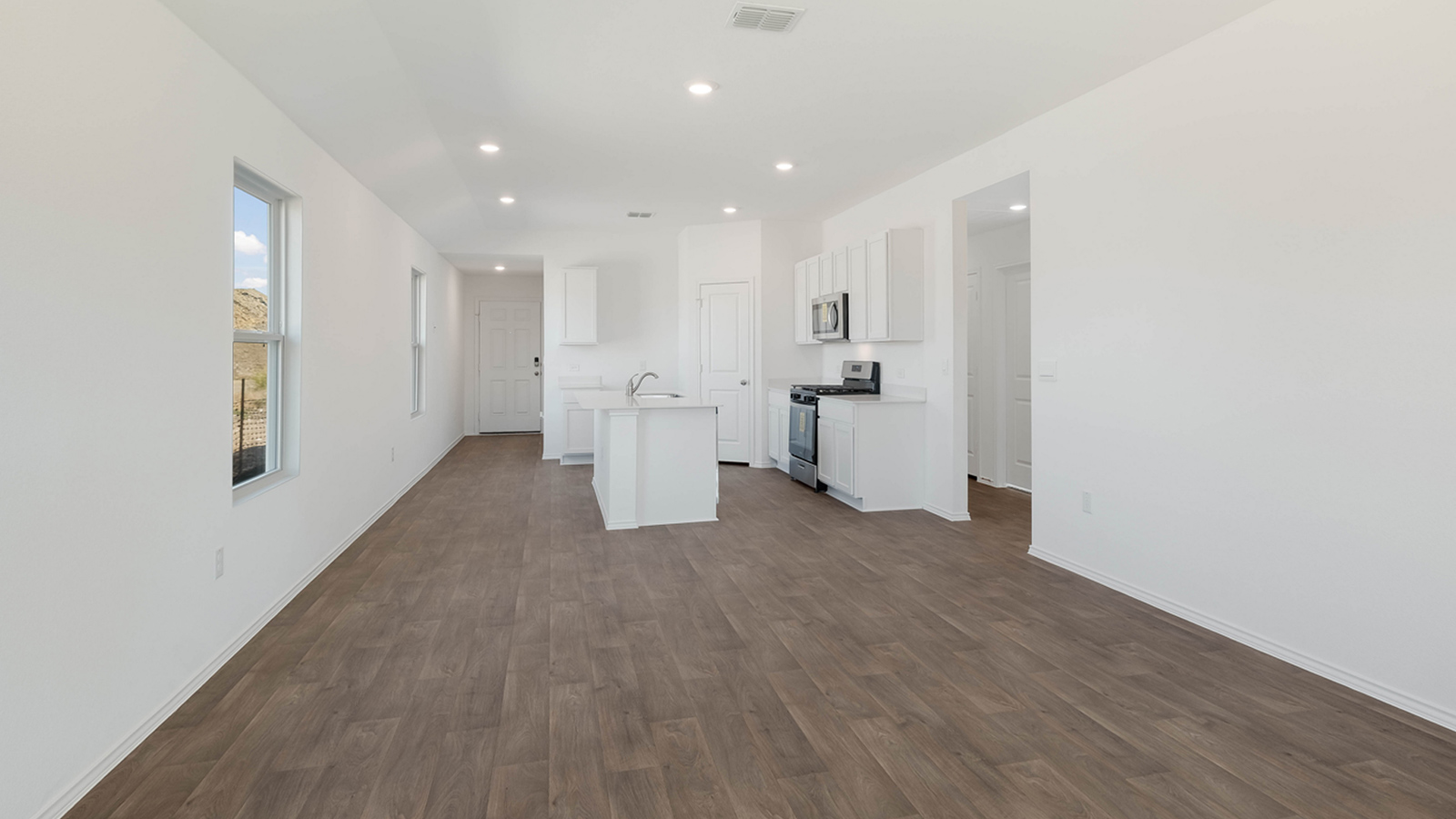 Open concept living room and kitchen.