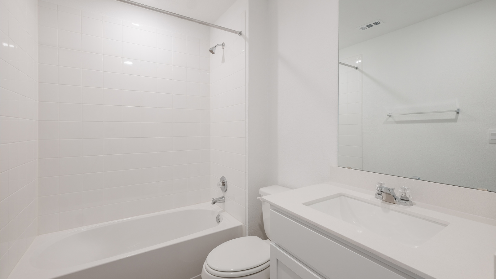 Bathroom 2 with single vanity sink and bathtub.