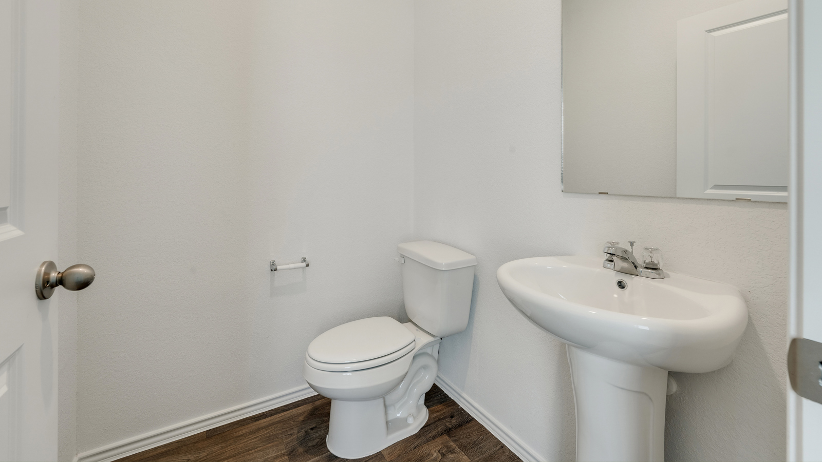 Powder bathroom located doanstiars.