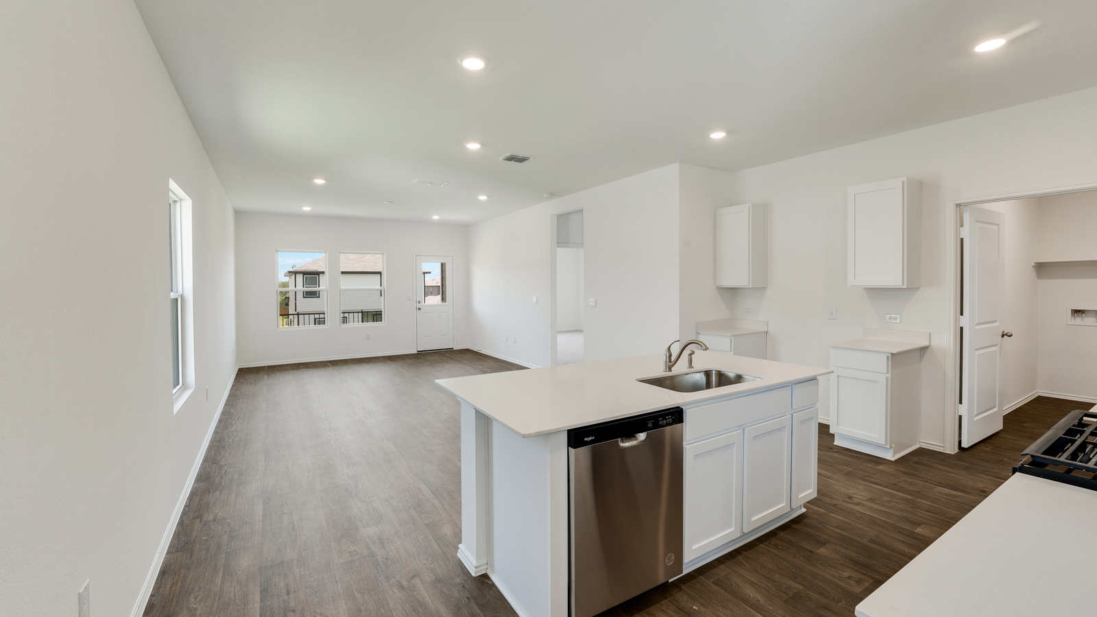 Stainless steel appliances in modern kitchen.