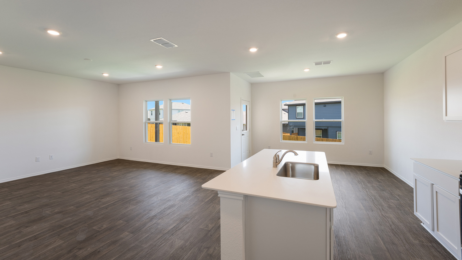 Quartz countertops in kitchen.