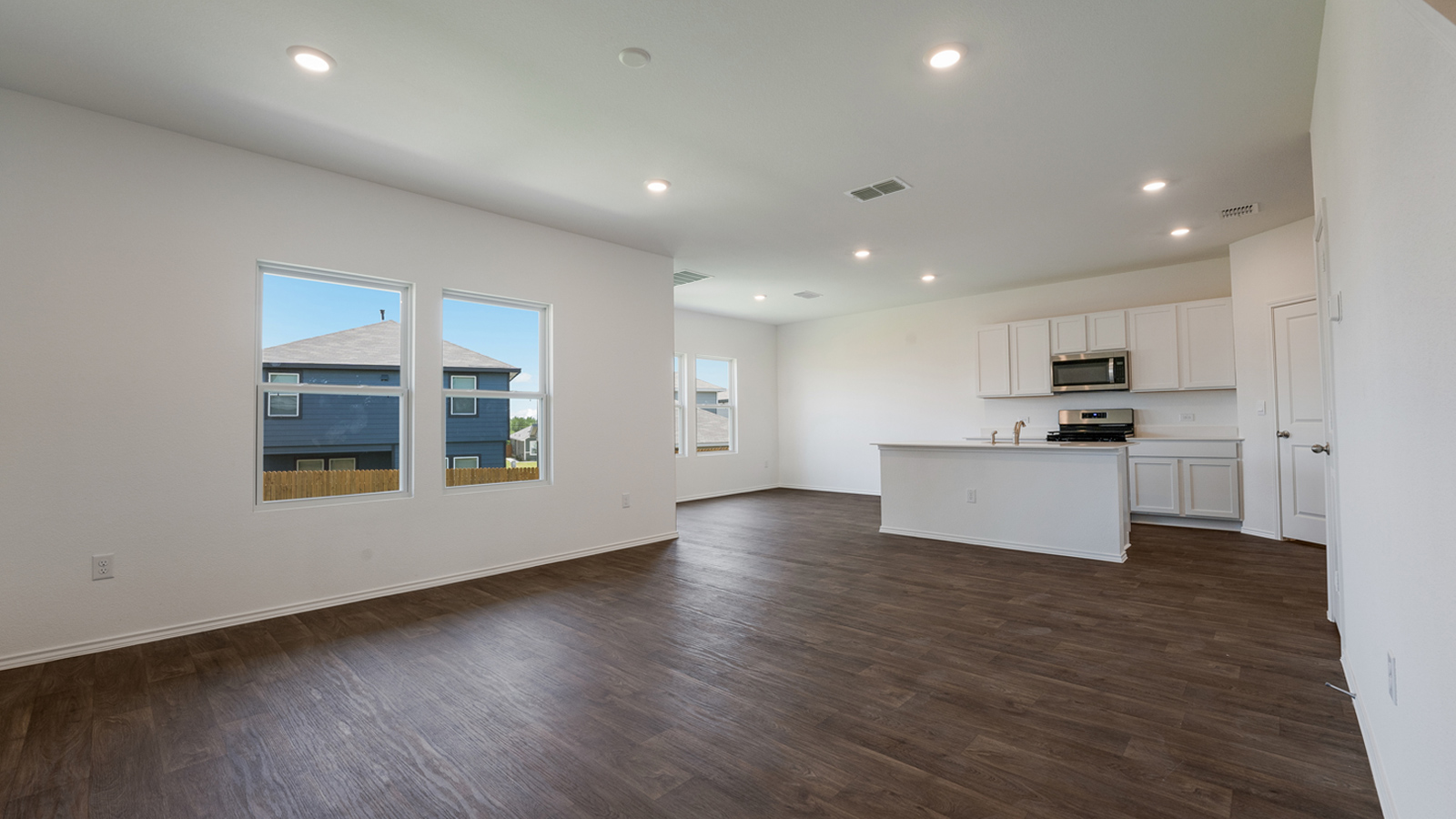 Open concept living room and kitchen.