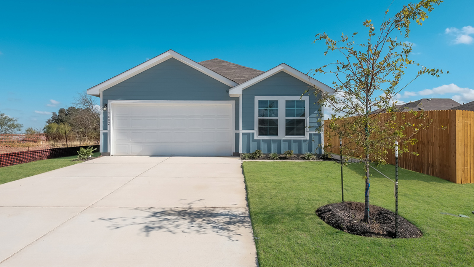 The Taylor Floorplan - B Elevation at Durango in Mustang Ridge, TX.