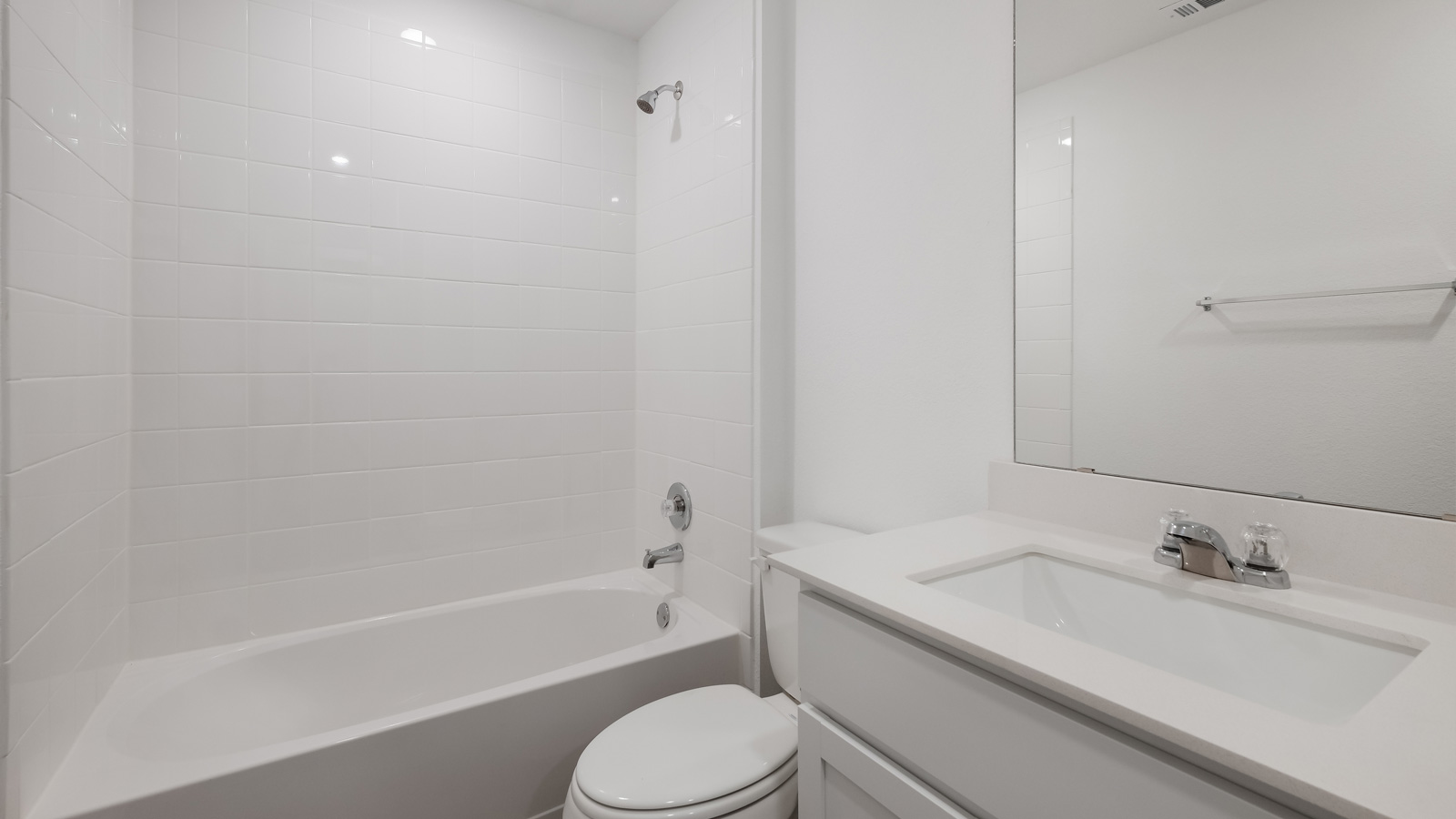 Bathroom 2 with single vanity sink and bathtub.