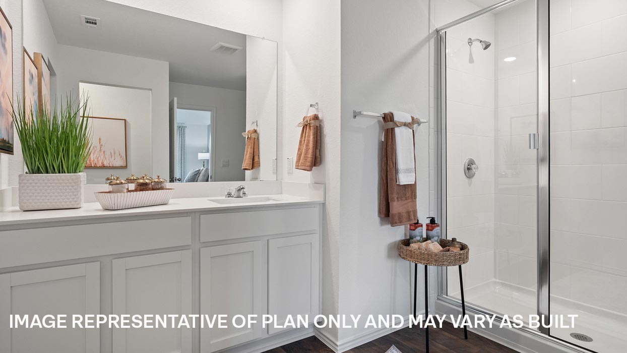 Primary bathroom with walk-in shower.
