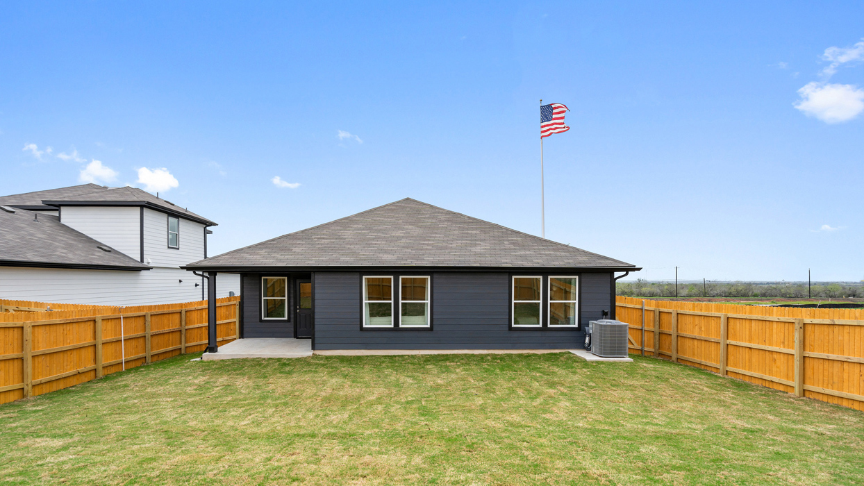 back exterior with covered patio