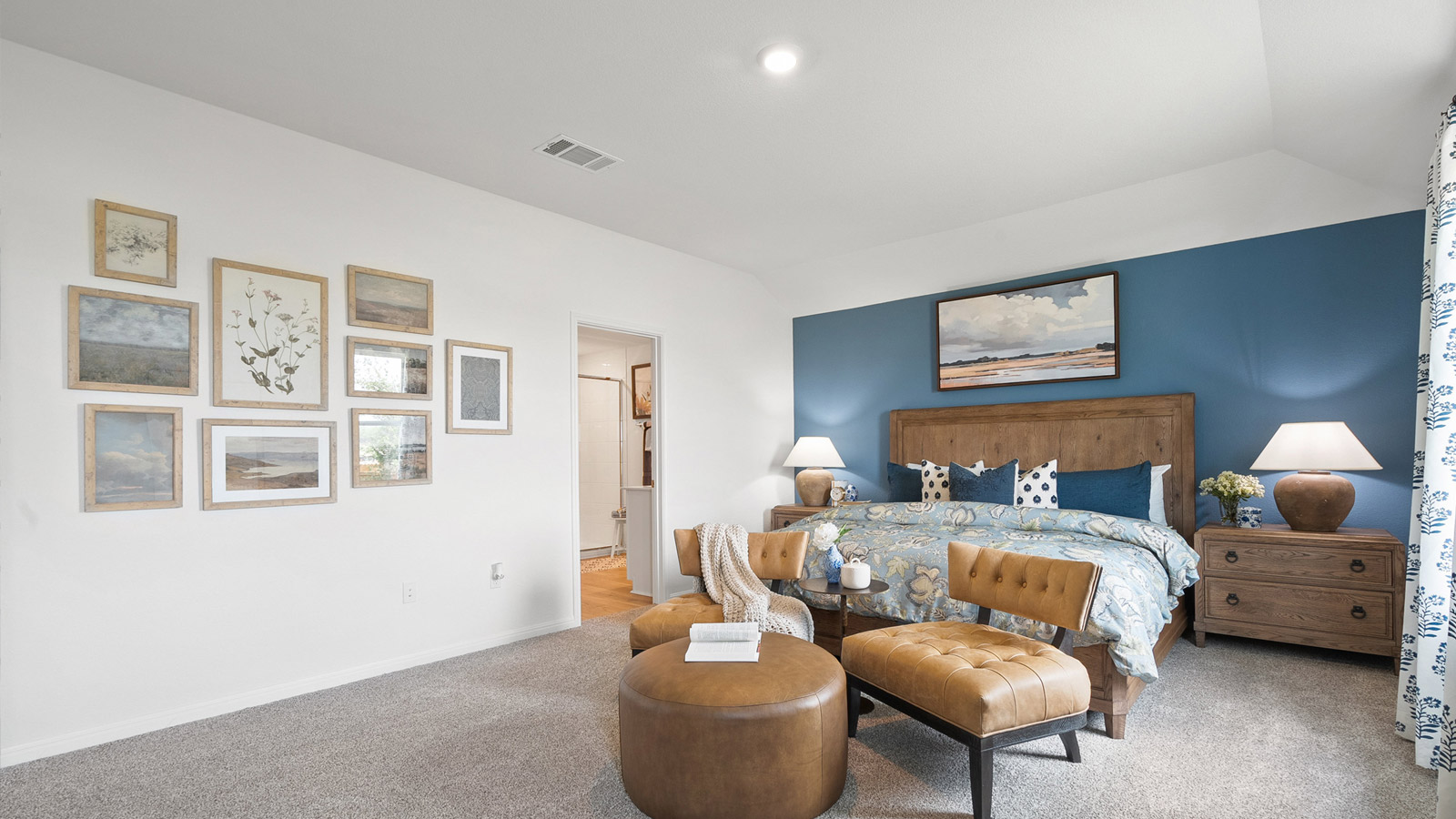 Interior bedroom with accent wall and windows
