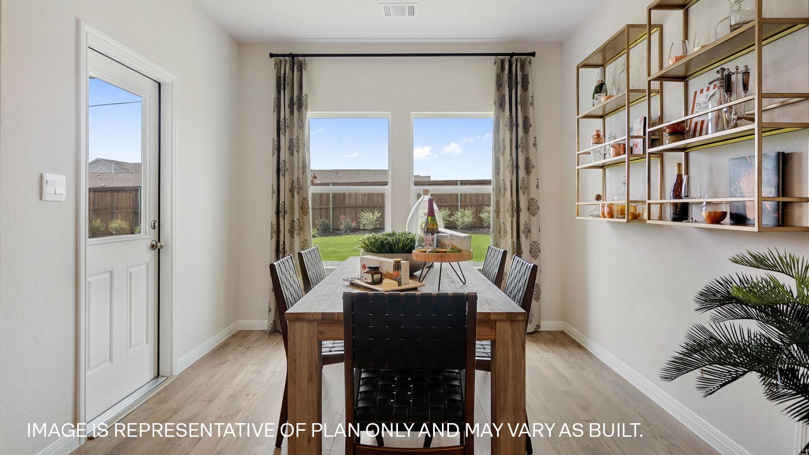 Dining area overlooking backyard.