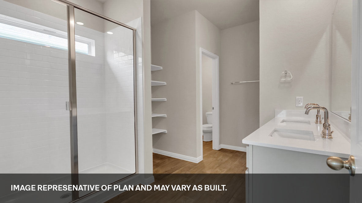 Interior bathroom with shower and double sink