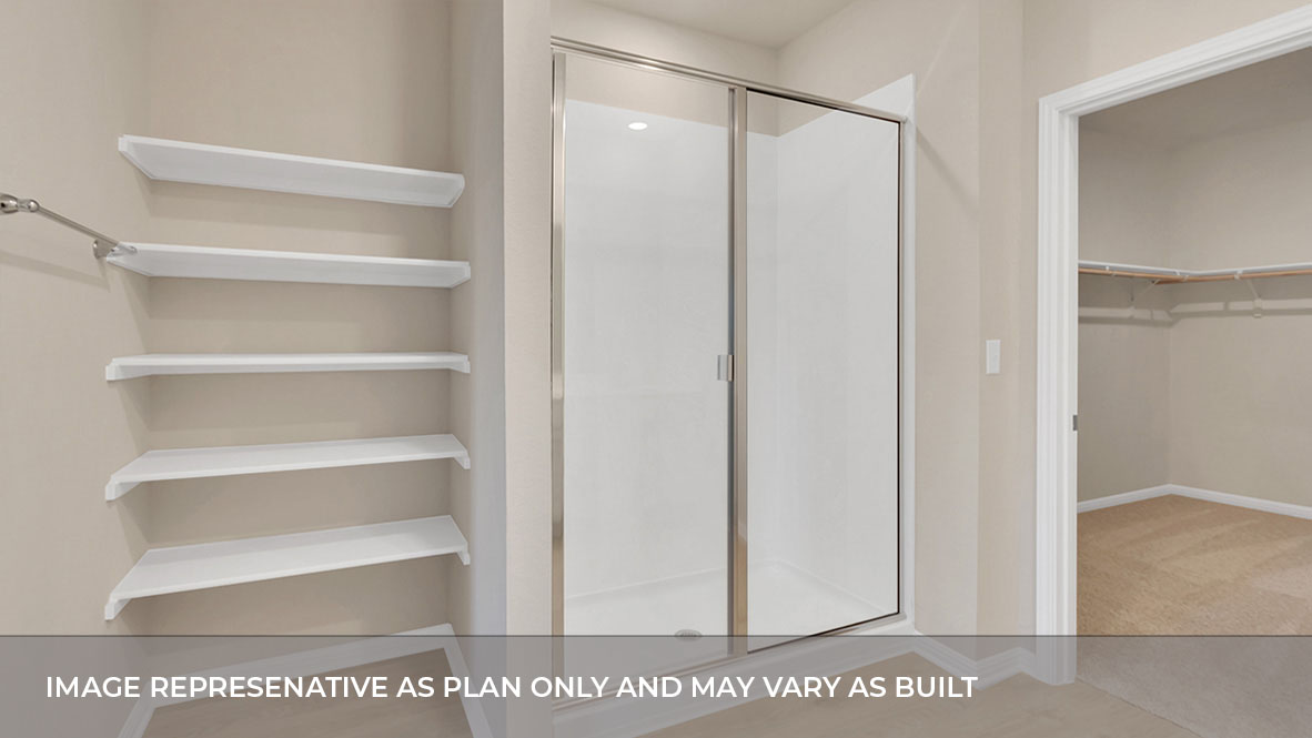 Interior primary bathroom with shower and shelving